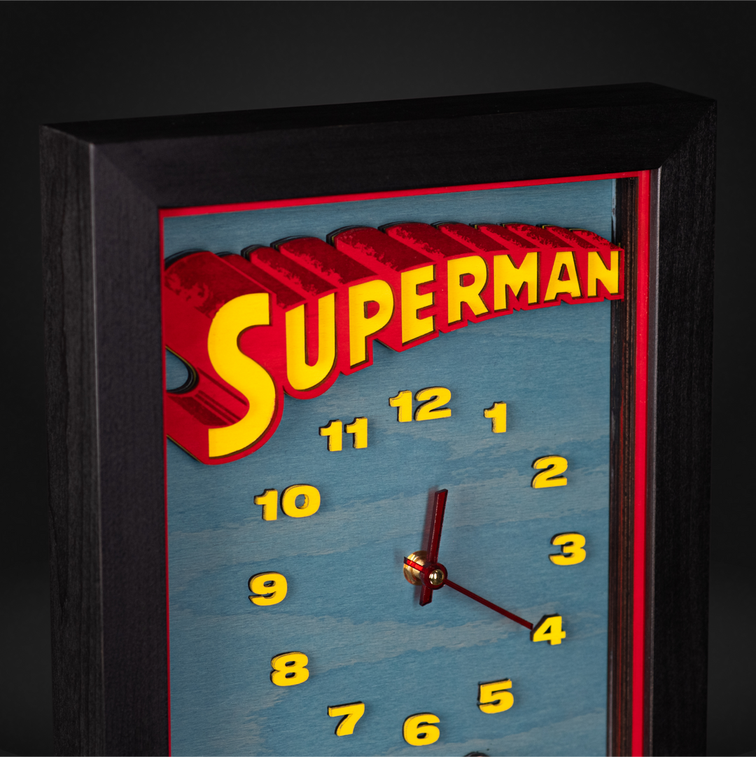 Superman clock with frame and plexiglass included for easy hanging.
