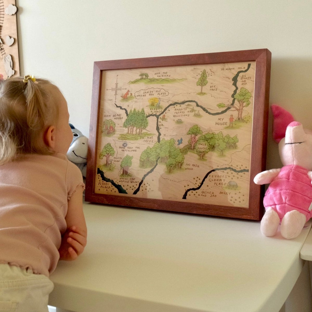 Handmade nursery wall decor featuring Hundred Acre Wood
